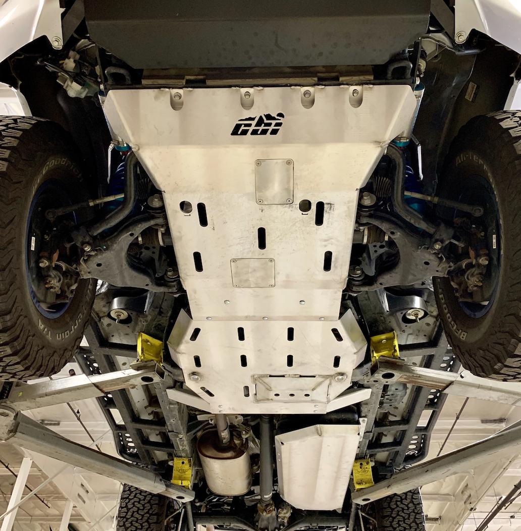 Steel front bumper, rock sliders, and skid plates on an off-road vehicle